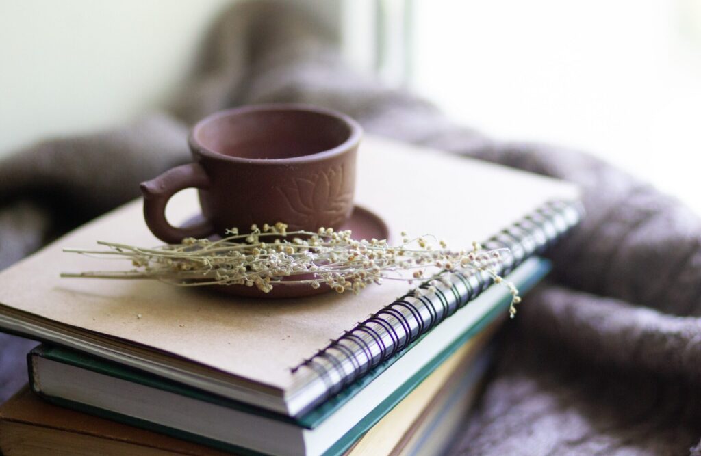 notebooks and tea mug ready for learning session